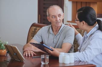 Doctor-talking-to-elderly-patient-530890