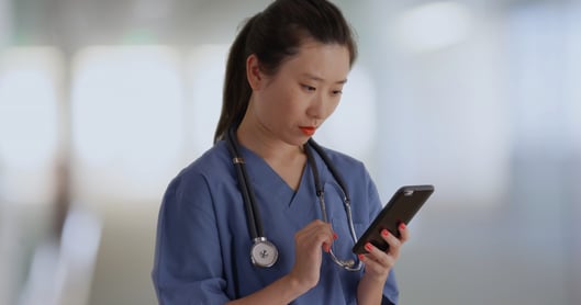 Nurse texting with a patient