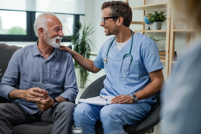 patient benefiting from remote patient monitoring talking to his doctor