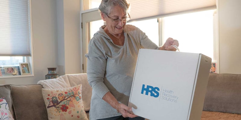 A patient receives their HRS remote patient monitoring kit.