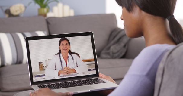 Physician performs telehealth visit with a rural patient from the patients home