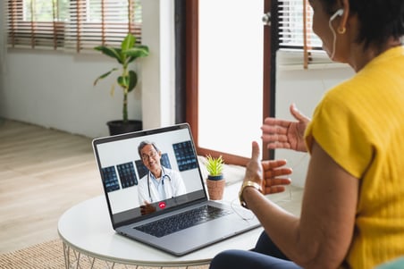 Women doing virtual visit doctor's appointment with her physician