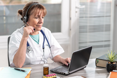 Image of nurse on telehealth conference call 
