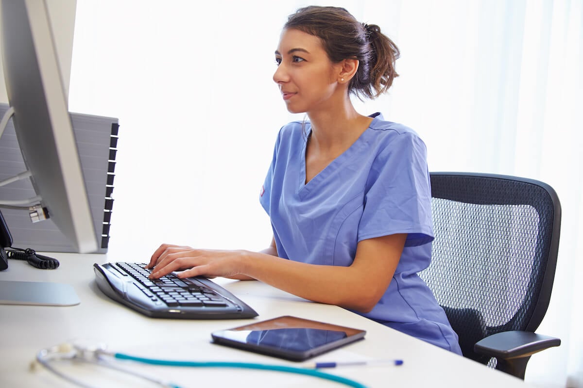 Nurse communicating with patients